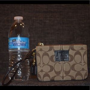 authentic coach signature light-brown wristlet